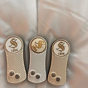 Gold and White Golf Club Sensors